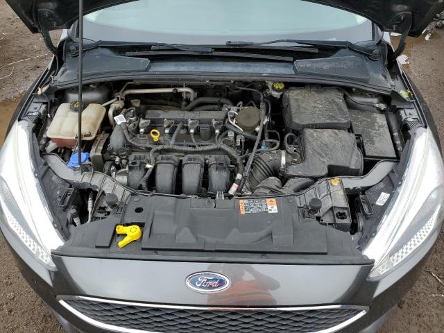 Photo 11 from auction – 2015 FORD FOCUS SE with VIN 1FADP3K29FL288174