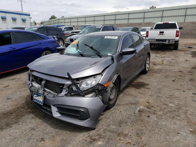 HONDA CIVIC LX 2018 with VIN 19XFC2F51JE019696 - Photo from auction