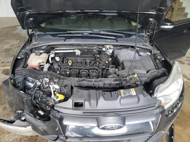 Photo 11 from auction – 2014 FORD FOCUS SE with VIN 1FADP3F23EL344778