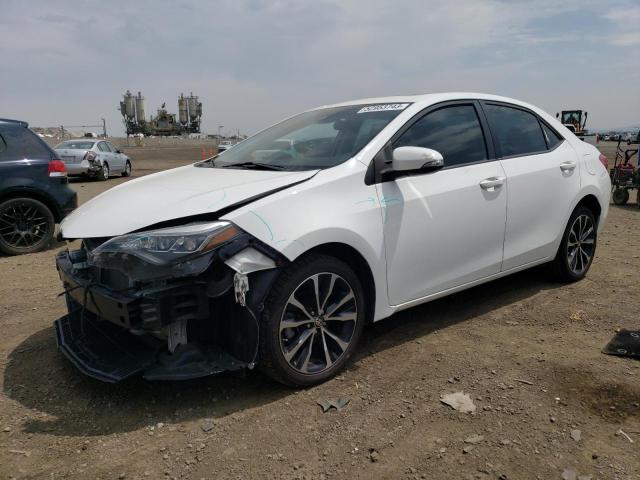 TOYOTA COROLLA L 2017 with VIN 5YFBURHE7HP703436 - Photo from auction