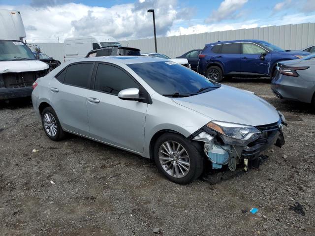 Photo 4 from auction – 2014 TOYOTA COROLLA L with VIN 5YFBURHE1EP039484