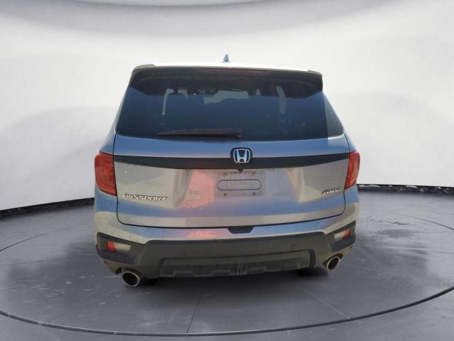 Photo 6 from auction – 2022 HONDA PASSPORT E with VIN 5FNYF8H57NB018746