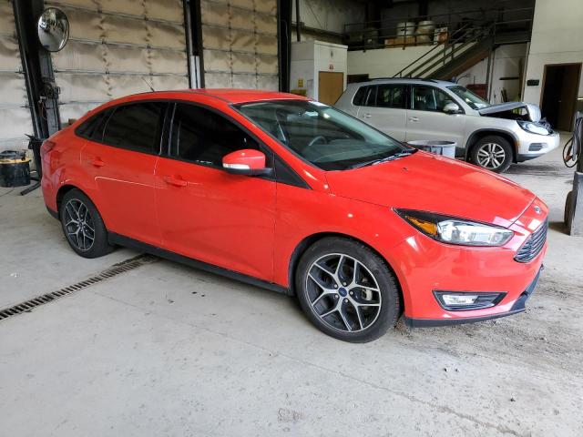 Photo 4 from auction – 2017 FORD FOCUS SE with VIN 1FADP3FE8HL310429