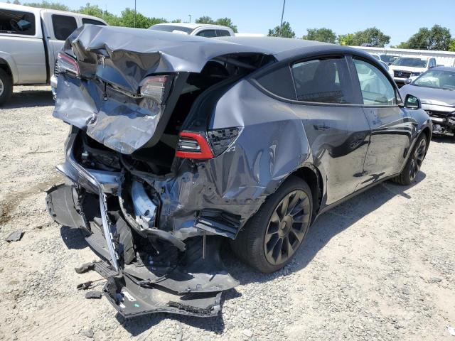 Photo 3 from auction – 2022 TESLA MODEL Y with VIN 7SAYGAEE2NF560624