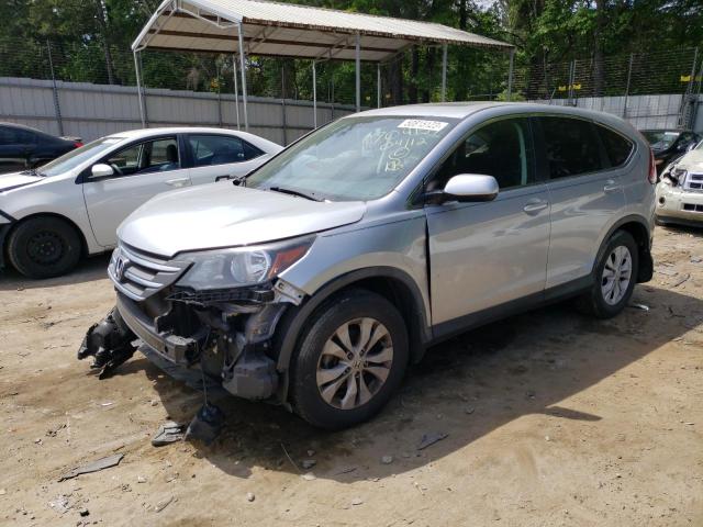HONDA CR-V EX 2014 with VIN 3CZRM3H59EG704157 - Photo from auction