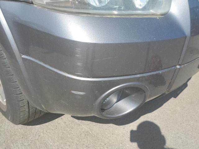 Photo 12 from auction – 2005 FORD ESCAPE LIM with VIN 1FMCU94125KD29122