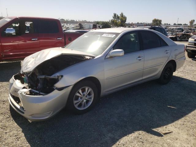 TOYOTA CAMRY LE 2004 with VIN 4T1BF32K74U070063 - Photo from auction