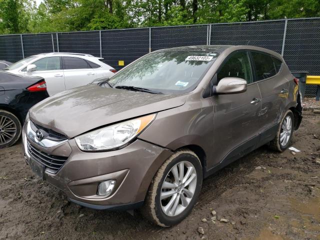 HYUNDAI TUCSON GLS 2011 with VIN KM8JUCAC2BU132378 - Photo from auction