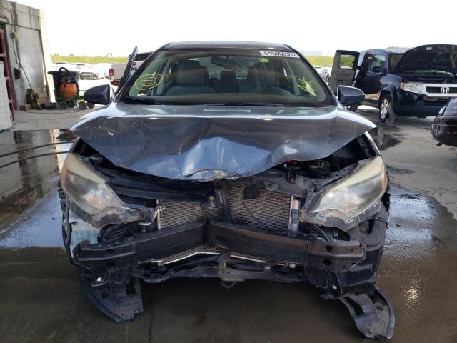 Photo 5 from auction – 2014 TOYOTA COROLLA L with VIN 2T1BURHE3EC057873