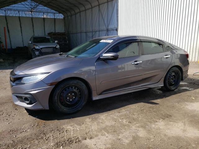 HONDA CIVIC TOUR 2016 with VIN 2HGFC1F92GH115347 - Photo from auction
