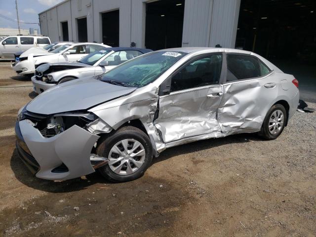 TOYOTA COROLLA L 2017 with VIN 2T1BURHE7HC810907 - Photo from auction