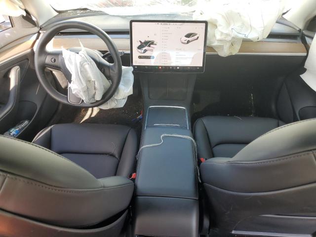 Photo 8 from auction – 2021 TESLA MODEL 3 with VIN 5YJ3E1EA3MF077121