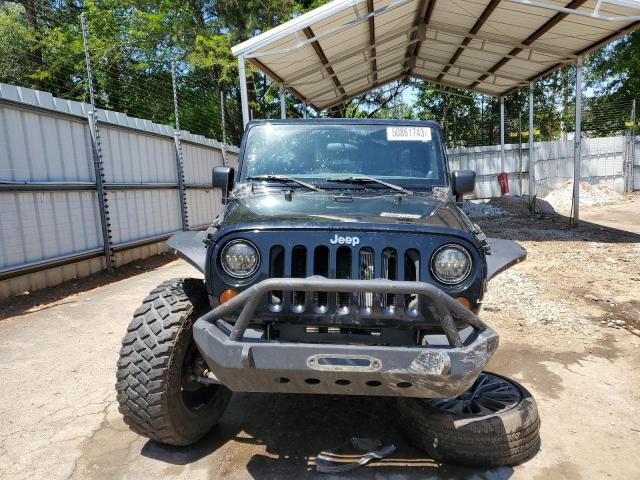Photo 5 from auction – 2011 JEEP WRANGLER U with VIN 1J4BA7H11BL590863