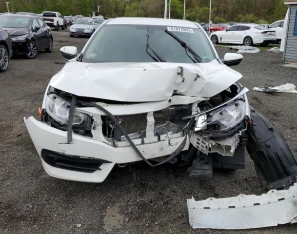 Photo 5 from auction – 2018 HONDA CIVIC LX with VIN 2HGFC2F54JH603242