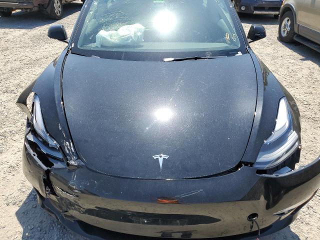 Photo 11 from auction – 2022 TESLA MODEL 3 with VIN 5YJ3E1EB6NF186473