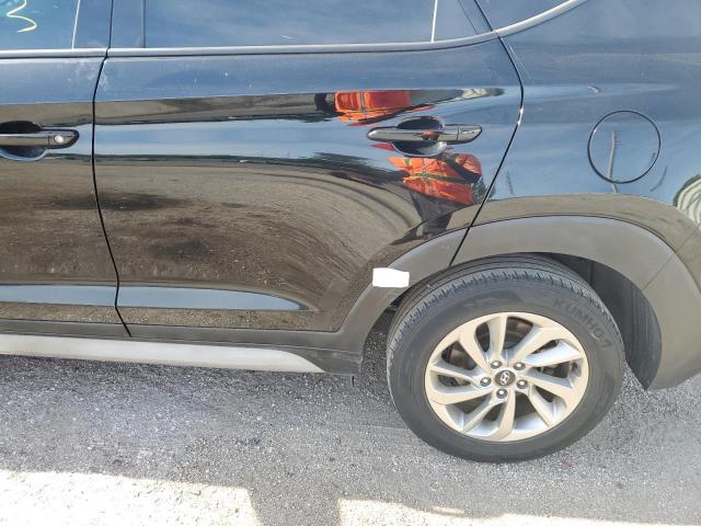 Photo 12 from auction – 2018 HYUNDAI TUCSON SEL with VIN KM8J3CA40JU767660
