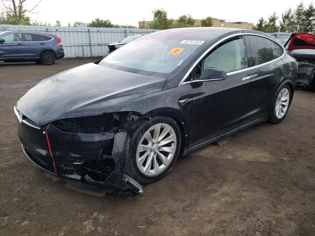TESLA MODEL X 2017 with VIN 5YJXCBE2XHF048937 - Photo from auction