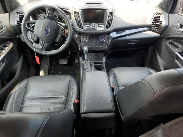 Photo 8 from auction – 2017 FORD ESCAPE TIT with VIN 1FMCU9J94HUE25529