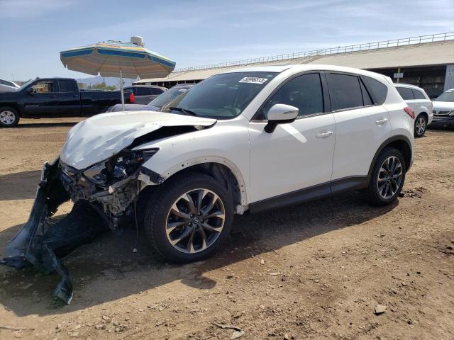 MAZDA CX-5 GT 2016 with VIN JM3KE4DY5G0857269 - Photo from auction