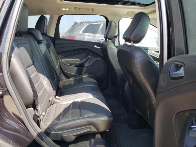 Photo 11 from auction – 2019 FORD ESCAPE TIT with VIN 1FMCU0J90KUA99988