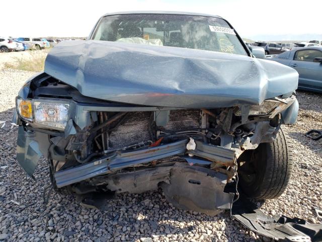 Photo 5 from auction – 2006 HONDA RIDGELINE with VIN 2HJYK16476H557940
