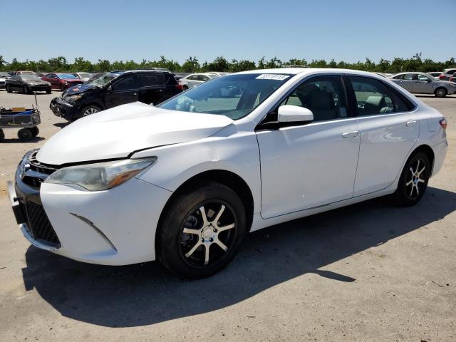 TOYOTA CAMRY LE 2016 with VIN 4T1BF1FK9GU166196 - Photo from auction