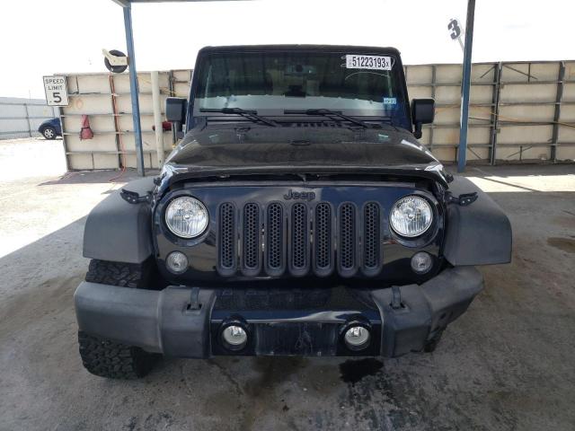 Photo 5 from auction – 2016 JEEP WRANGLER U with VIN 1C4BJWDG9GL337968