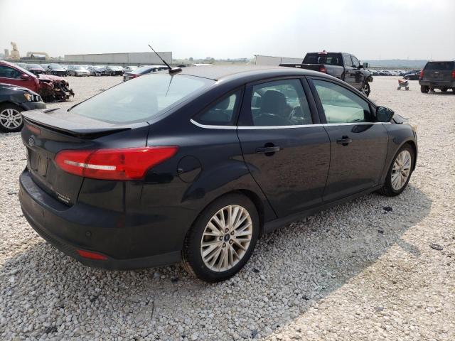 Photo 3 from auction – 2016 FORD FOCUS TITA with VIN 1FADP3J28GL222993