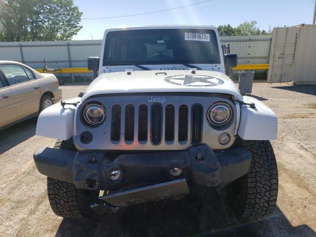Photo 5 from auction – 2014 JEEP WRANGLER U with VIN 1C4BJWDG2EL220715