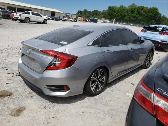 Photo 3 from auction – 2018 HONDA CIVIC EX with VIN JHMFC1F36JX011584