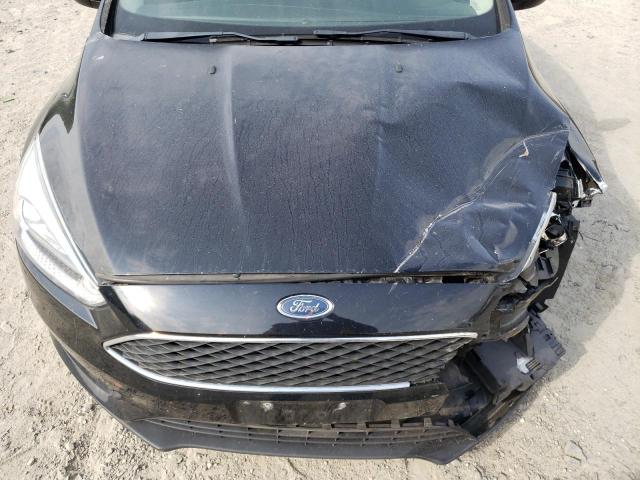 Photo 11 from auction – 2016 FORD FOCUS S with VIN 1FADP3E21GL273620