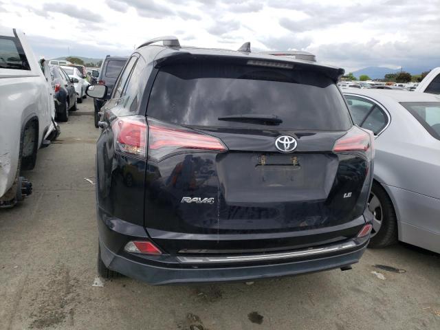 Photo 6 from auction – 2018 TOYOTA RAV4 LE with VIN 2T3ZFREV4JW433560