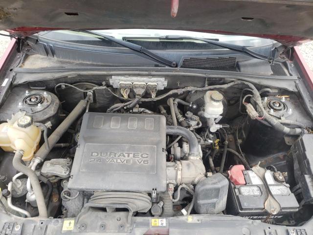 Photo 12 from auction – 2009 FORD ESCAPE LIM with VIN 1FMCU94G59KA36907