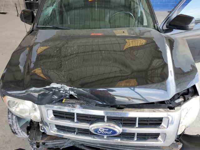 Photo 12 from auction – 2011 FORD ESCAPE LIM with VIN 1FMCU0EG4BKB26923