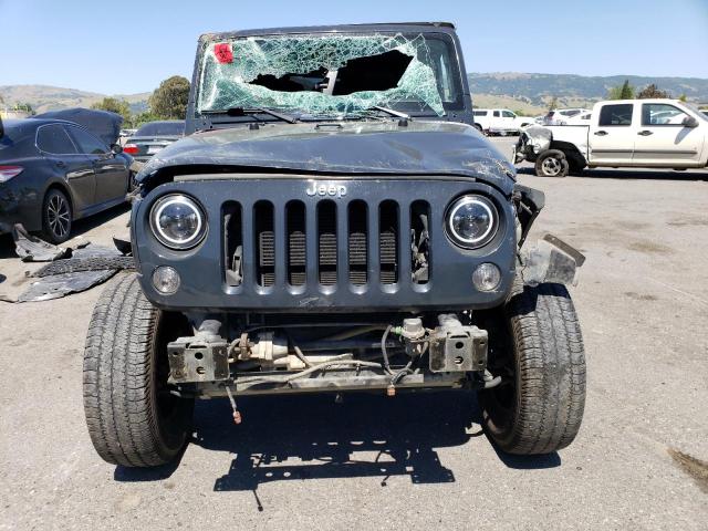 Photo 5 from auction – 2016 JEEP WRANGLER U with VIN 1C4BJWFG4GL278826