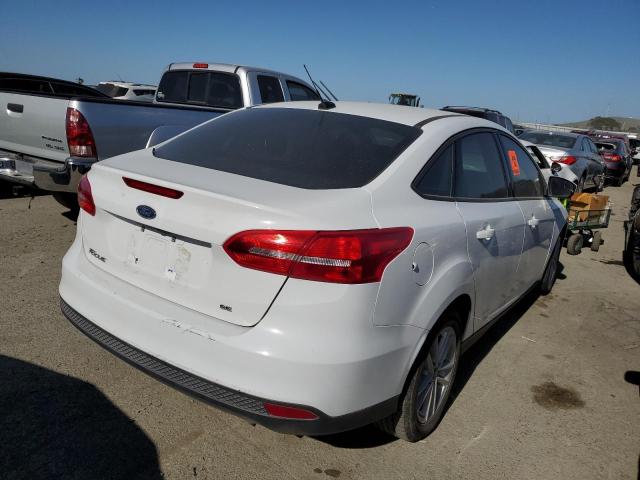 Photo 3 from auction – 2018 FORD FOCUS SE with VIN 1FADP3F22JL236677