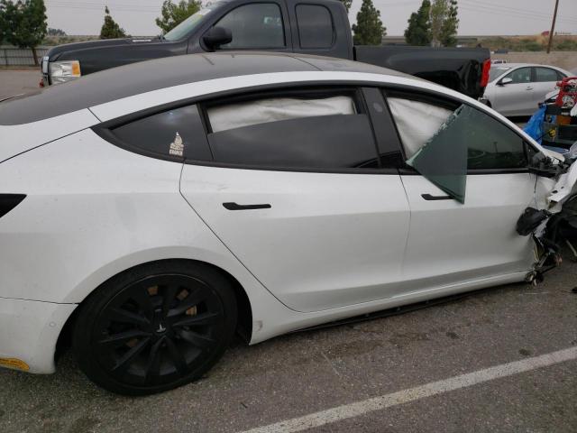 Photo 10 from auction – 2021 TESLA MODEL 3 with VIN 5YJ3E1EA3MF977890