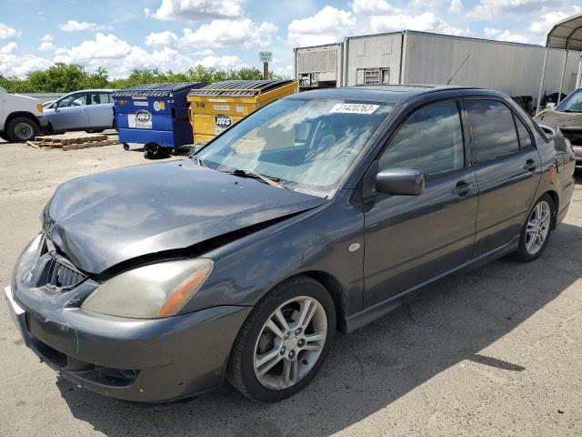 MITSUBISHI LANCER RAL 2004 with VIN JA3AJ66F04U022741 - Photo from auction