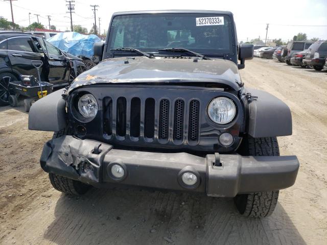 Photo 5 from auction – 2015 JEEP WRANGLER U with VIN 1C4BJWDG7FL527024
