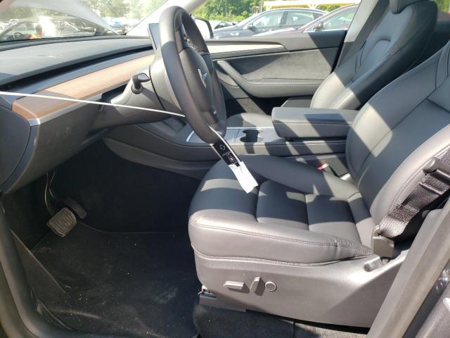 Photo 7 from auction – 2023 TESLA MODEL Y with VIN 7SAYGDEE5PA060670