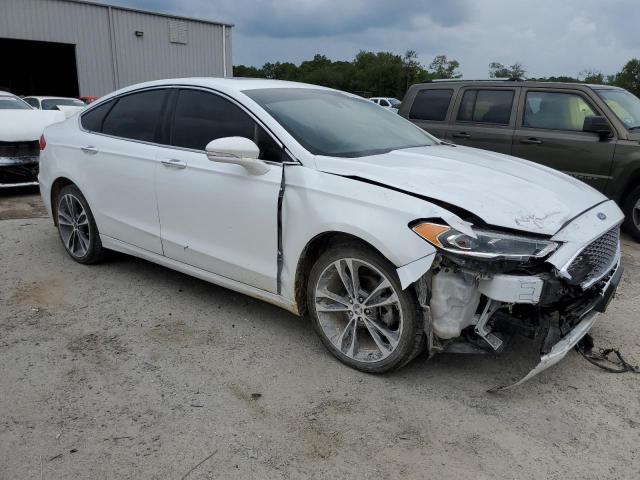 Photo 4 from auction – 2019 FORD FUSION TIT with VIN 3FA6P0D96KR139296