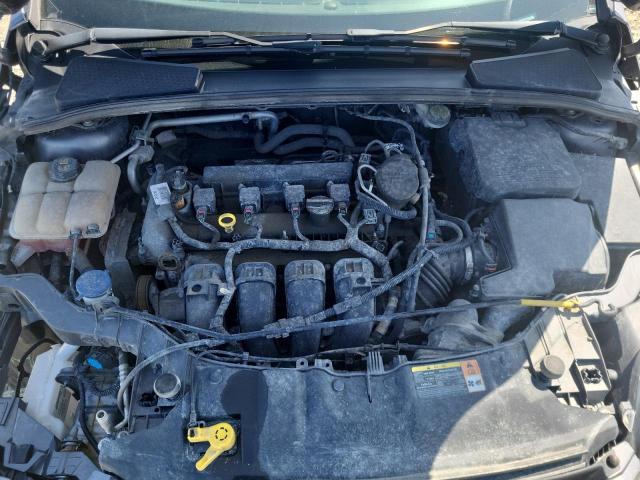 Photo 11 from auction – 2014 FORD FOCUS SE with VIN 1FADP3F26EL124731