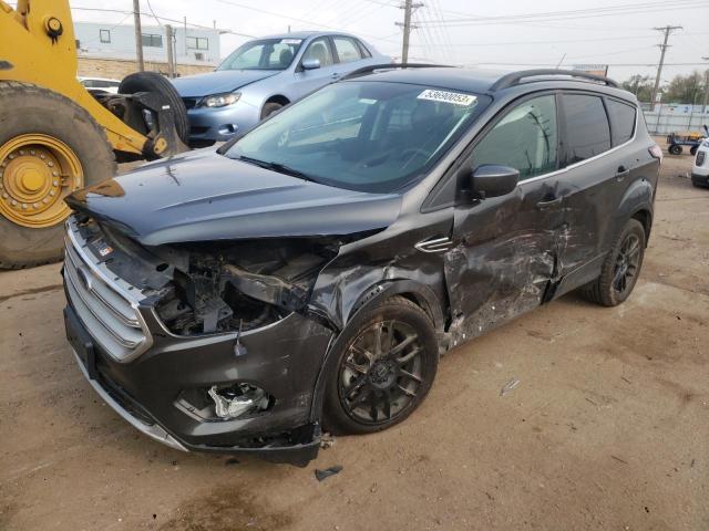 FORD ESCAPE SE 2018 with VIN 1FMCU9GD4JUD29417 - Photo from auction