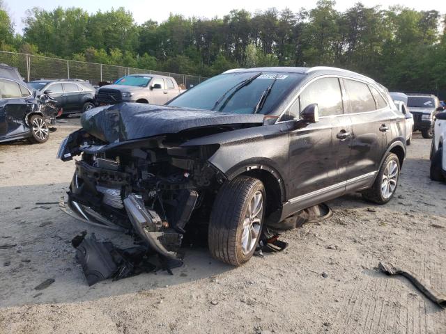 LINCOLN MKC 2015 with VIN 5LMCJ2A95FUJ08577 - Photo from auction
