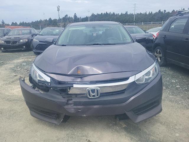 Photo 5 from auction – 2017 HONDA CIVIC LX with VIN 2HGFC2F59HH037282