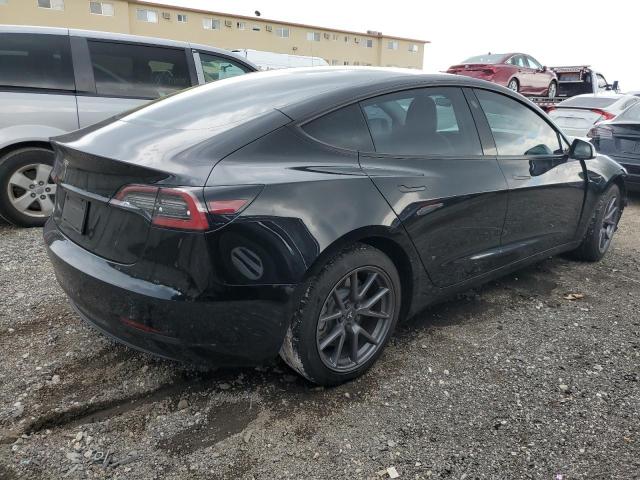 Photo 3 from auction – 2021 TESLA MODEL 3 with VIN 5YJ3E1EA6MF859302