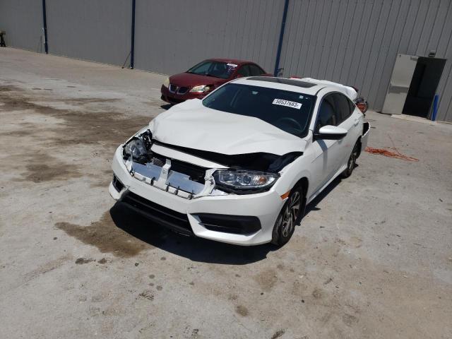HONDA CIVIC EX 2018 with VIN 19XFC2F74JE036512 - Photo from auction