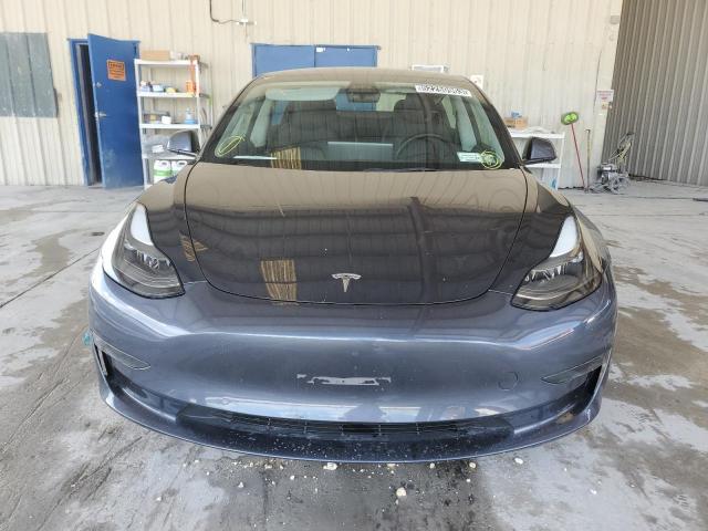 Photo 5 from auction – 2021 TESLA MODEL 3 with VIN 5YJ3E1EA0MF085662