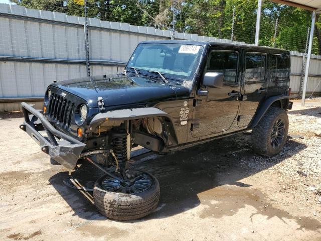 JEEP WRANGLER U 2011 with VIN 1J4BA7H11BL590863 - Photo from auction