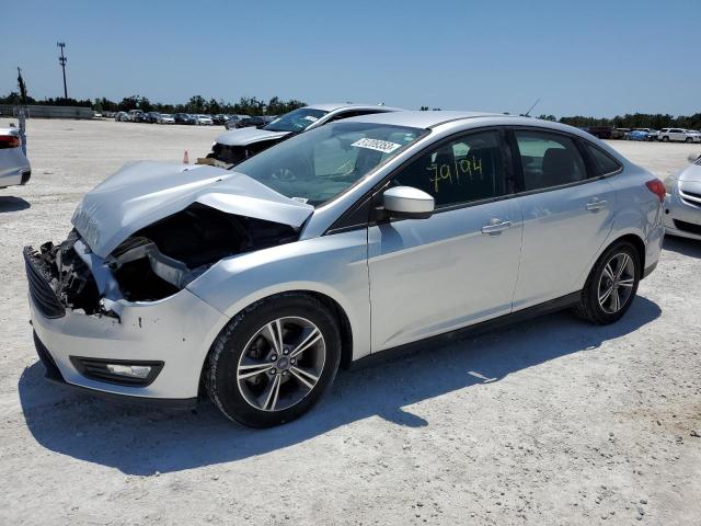 FORD FOCUS SE 2018 with VIN 1FADP3FE8JL308539 - Photo from auction